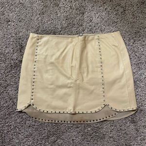 Leather studded mini skirt